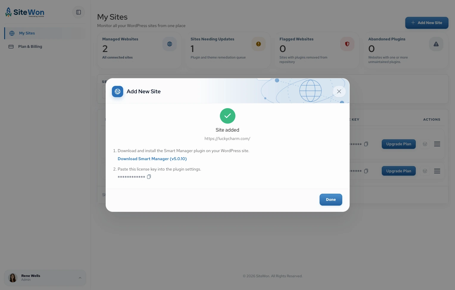 Site added dialog with the Smart Manager download and a masked license key